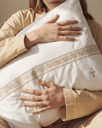 Model with a House of Alenza Egyptian cotton pillowcase